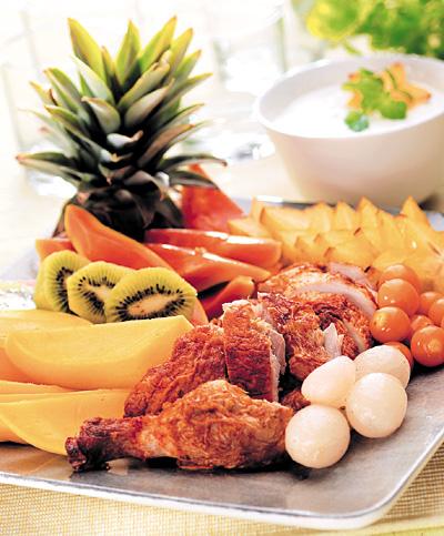 Exotisk kycklingtallrik för stora festen