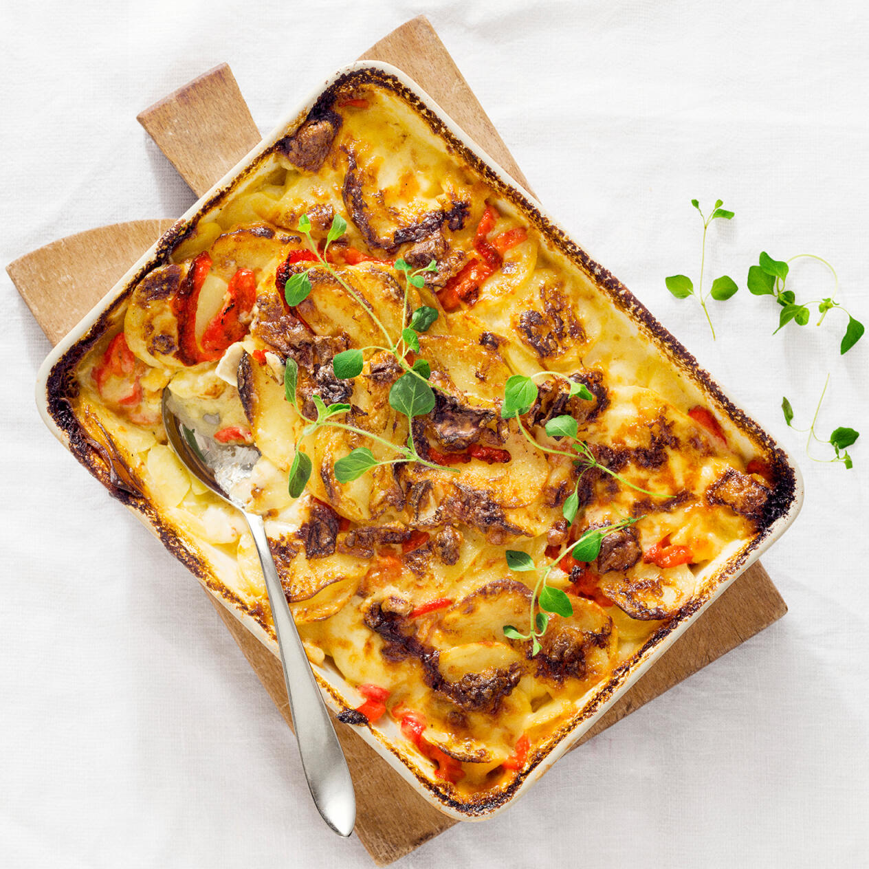 Potatisgratäng med chèvre och paprika