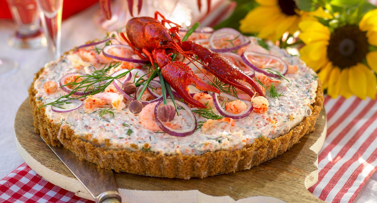Cheesecake med räkor och kräftstjärtar