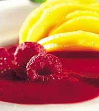 Färsk mango på hallonspegel