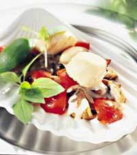 Pilgrimsmusslor i vitvinssås